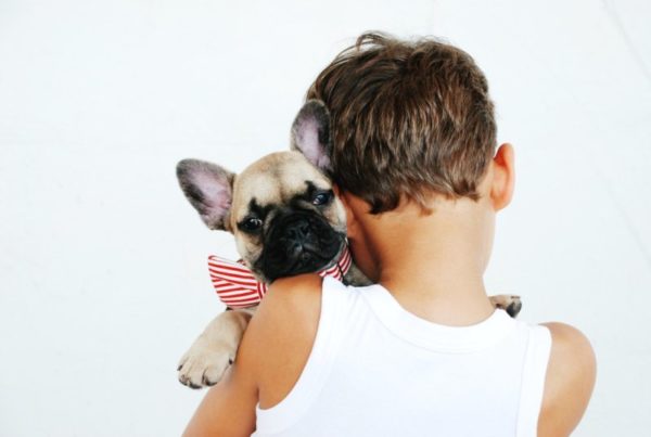 kid_holding_puppy.jpeg