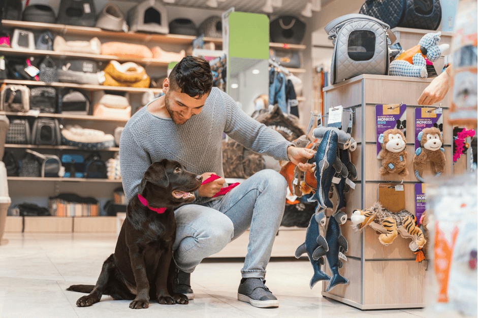 owner_and_dog_in_pet_shop.webp